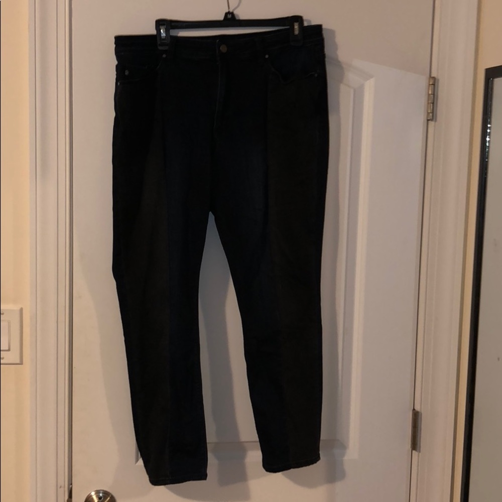 Blue and black denim jeans